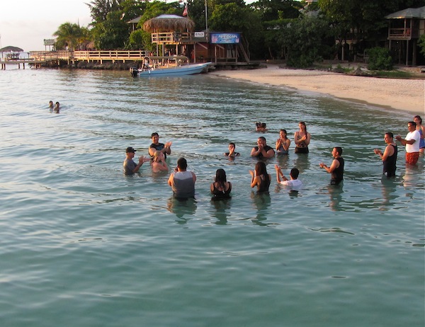 Getting baptized in the ocean - West Bay, Roatan, Honduras